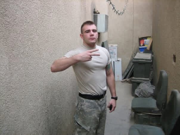 Antonio in Army physical training gear on deployment